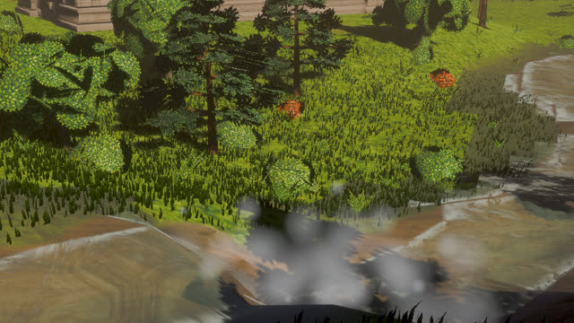 A river and waterfall below a wooded slope